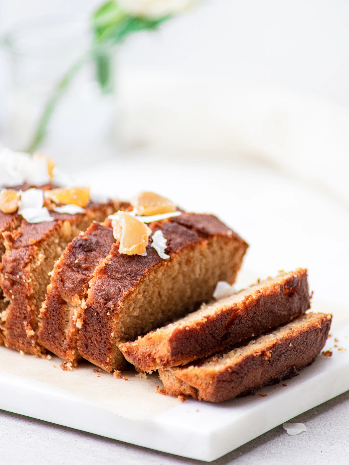 A sticky loaf of parkin cut into thick slices